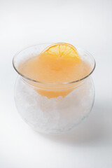 Cocktail with ice crust and orange liqueur.