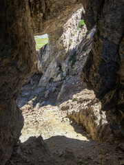 Fototapeta na wymiar Panoramic view of the rocky arch of Greina, Switzerland.