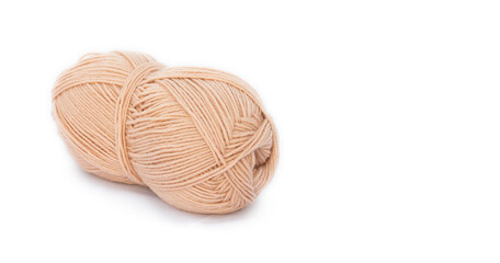 beige roll of yarn on isolated background