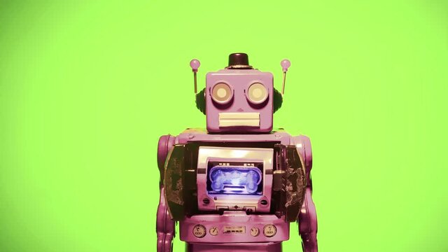 retro pink robot toy with green screen yes no wobble 