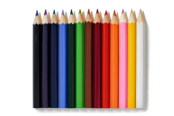 Overhead view of different coloured pencils isolated on white background