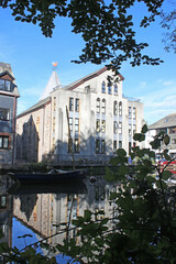 Buildings reflected in the River Dart at Totnes	