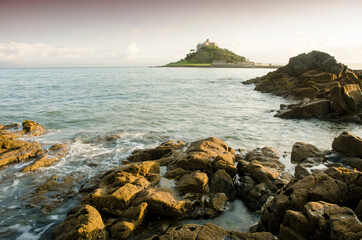 A cloudy bright summer sky above St Michaels mount, Cornwall, England