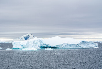 Antarctica, Peninsula, icebergs floating between Detail Island and Lemaire Channel.
