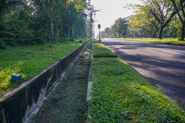 Roadside drains  or sewer in the park are made of cast cement