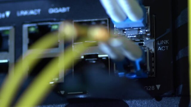 Status indicator light of network equipment connected to the server system with LAN cable on the development of computer network technology.