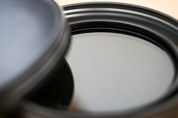 Polarizing filter for reflex camera lens in its case