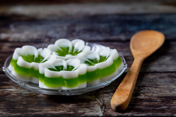 
Delicious pandan coconut jelly placed in a serving dish.