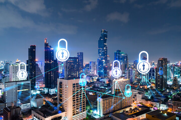 Glowing Padlock hologram, night panoramic city view of Bangkok, Asia. The concept of cyber security to protect companies. Double exposure.
