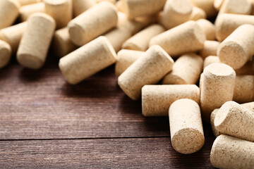 Wine corks on brown wooden table