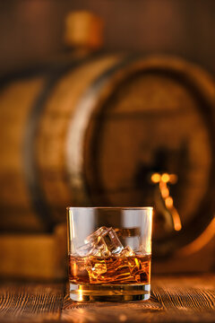 Glass of whiskey with ice
