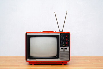 Vintage TV set isolated. Retro television - Old vintage red television, retro technology. Ancient...