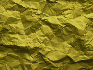 crumpled yellow paper