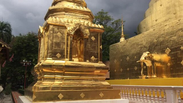Golden stupa of Phra Singha public Thai temple