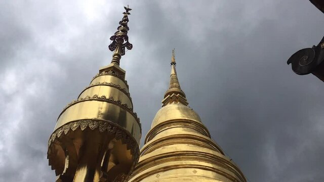 Golden main stupa of Phra Singha public Thai temple.