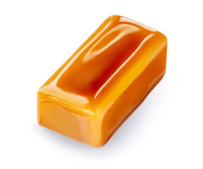 Soft Homemade salted caramel piece isolated on white background. Golden Butterscotch toffee candy caramel macro. Top view