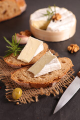 bread slices with portion of camembert