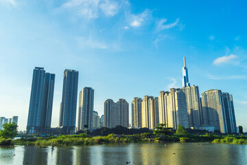 Naklejka premium Panorama landscape view at Landmark 81 is a super tall skyscraper in center Ho Chi Minh City, Vietnam and Thu Thiem bridge with development buildings.