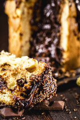 sliced ​​chocolate panettone with dripping chocolate filling, typical Christmas dessert in Brazil and Italy