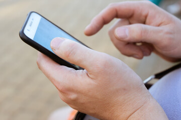 Man hands scroll screen mobile smart phone