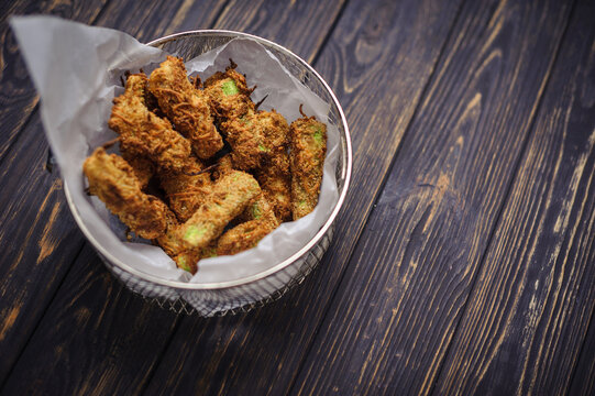 Fried chicken or vegan naggets on rustic background. Tasty snacks. Food recipes