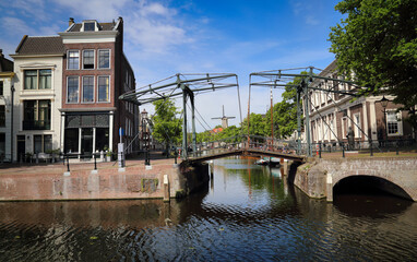 Naklejka premium Drawbridge and windmill in Schiedam, Holland