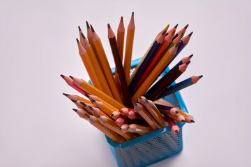 pencils in a office glass on a white background