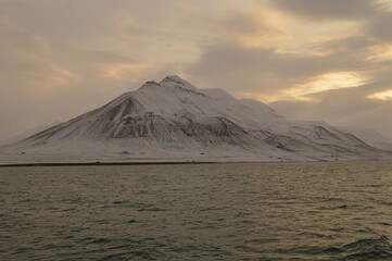 Winter sunset over the ice fjords of the Archipelago of Svalbard (Spitsbergen) in Norway