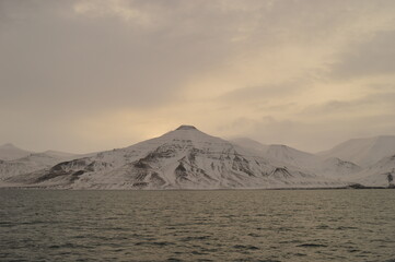 Winter sunset over the ice fjords of the Archipelago of Svalbard (Spitsbergen) in Norway