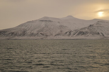 Winter sunset over the ice fjords of the Archipelago of Svalbard (Spitsbergen) in Norway