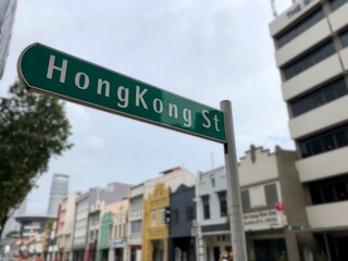 Obraz premium Hong Kong Street Sign in Singapore.