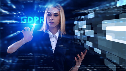 Business, Technology, Internet and network concept. Young businessman working on a virtual screen of the future and sees the inscription: GDPR