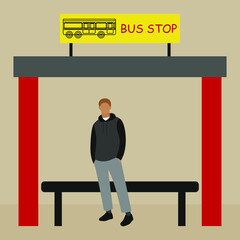 Man waiting for a bus at a bus stop