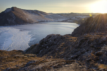 beautiful sunset at winter lake baikal