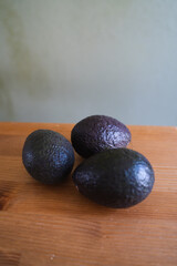 Avacados on a wooden table