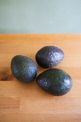 Avacados on a wooden table