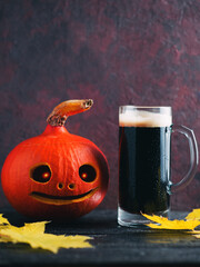 Pumpkin ale. Craft autumn beer in a mug