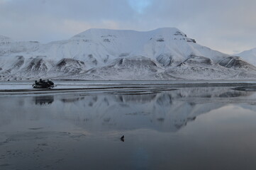 Sunset in the ice fjords of the Norwegian Archipelago of Svalbard, Norway