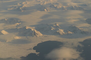 Sunset reflections over the frozen Arctic Norwegian Archepelago of Svalbard, Norway