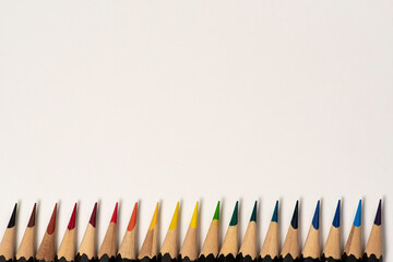 Colour pencils isolated on white background. Macro