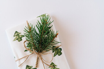 Christmas or new year's background, plain composition of Christmas gifts and fir branches, Flatlay, empty space for greeting text.christmas concept