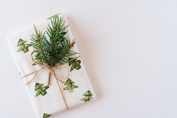 Christmas or new year's background, plain composition of Christmas gifts and fir branches, Flatlay, empty space for greeting text.christmas concept