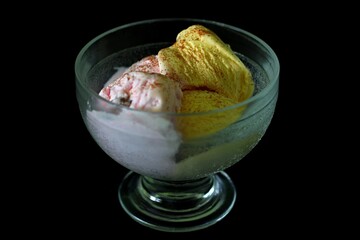 A cup of ice cream on a black background 01