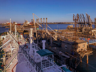 Beautiful morning and gas cargo terminal with ships alongside in the Pembroke, England
