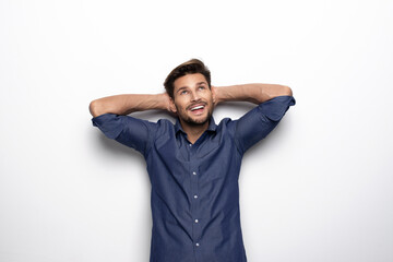 Happy handsome man over blue background