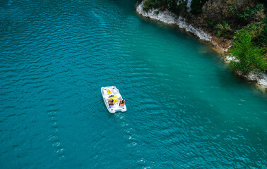 Boat drives on the river through the canyon. Grand Canyon du Verdon, France