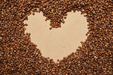 buckwheat on a backdrop. rustic buckwheat background. buckwheat heart sign for instagram.