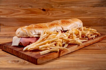 Meat sandwich with wood backgound