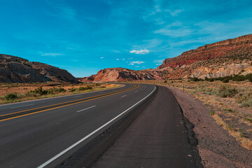 Road trip in Arizona desert. Background of road and sky.