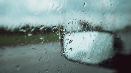 rain drops on car window - Powered by Adobe